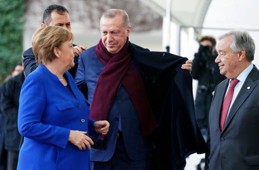 Bundeskanzlerin Merkel mit dem türkischen Staatspräsidenten Erdogan bei der Libyen-Konferenz in Berlin. Foto: dpa/Kay Nietfeld
